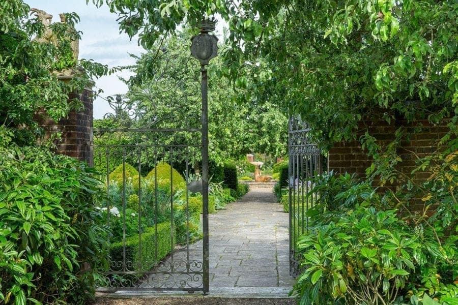 Intricate garden gate, one of many beautiful and unique areas on the Farleigh House estate