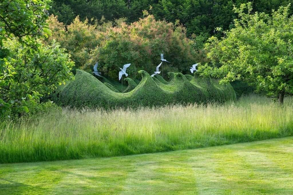 Farleigh Wallop Estate & garden - avian sculptures by Diane Maclean and yew waves created by Andrew Woolley.