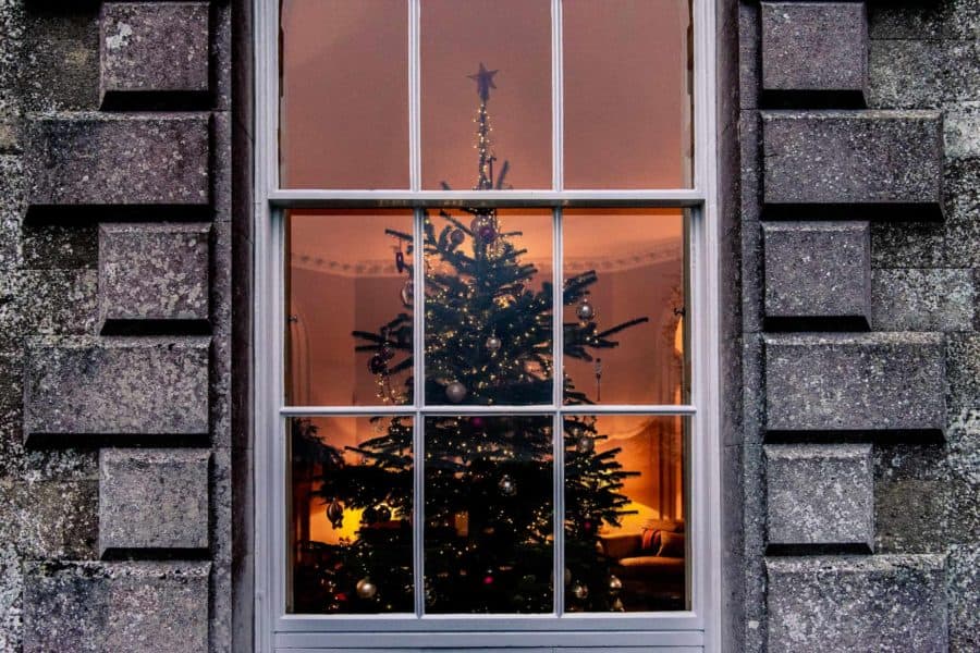 Farleigh House decorated for Christmas with a large Christmas Tree